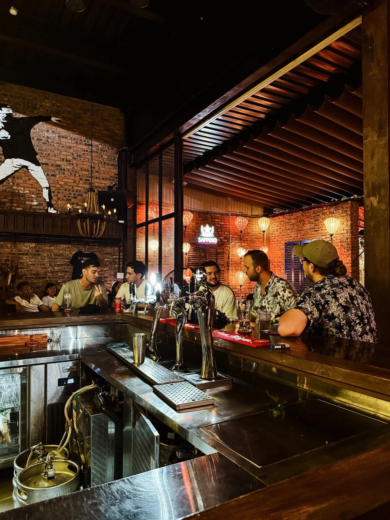 Guests gathered at the Cheers bar during a busy night
