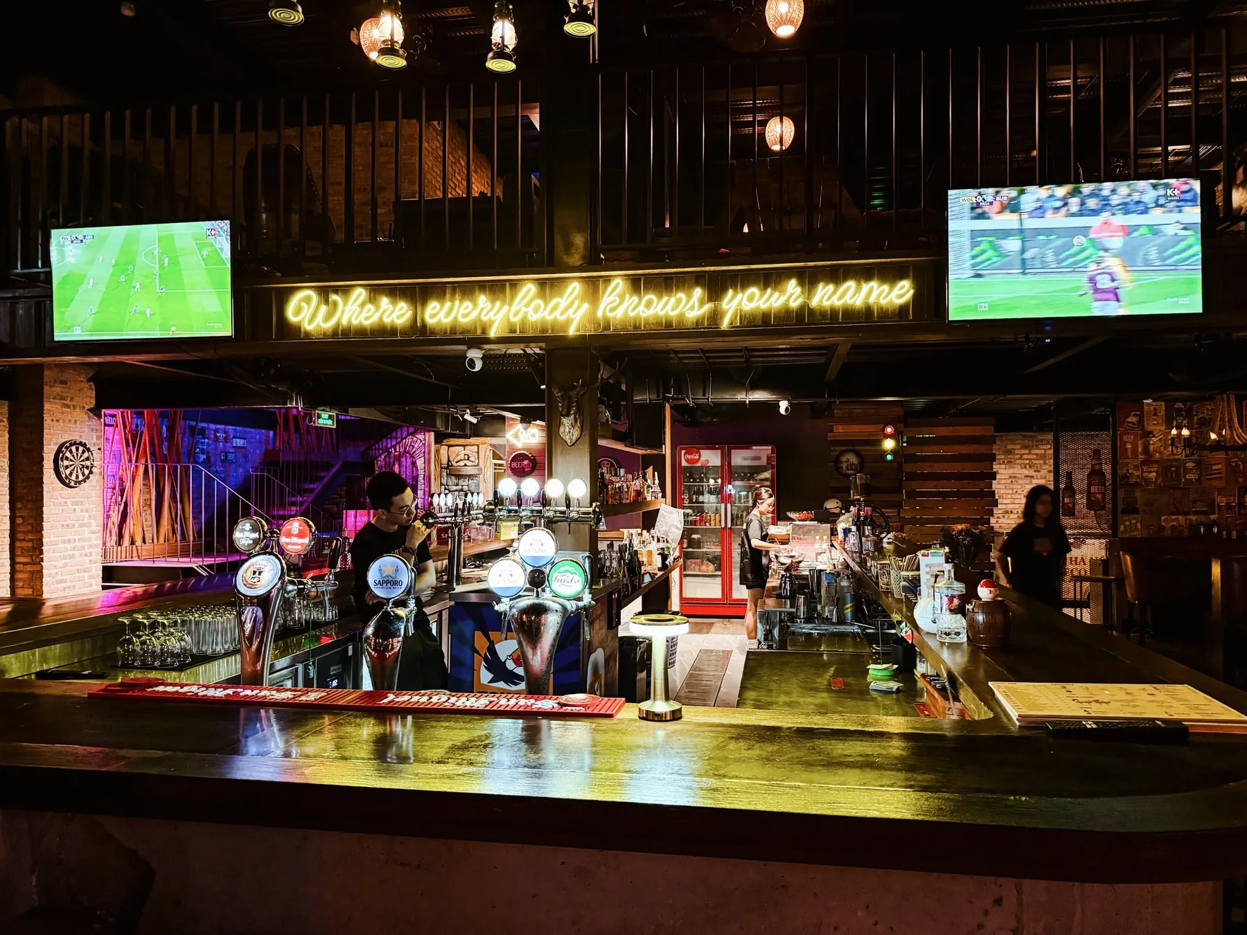 A wide view across the Cheers bar on a lively evening